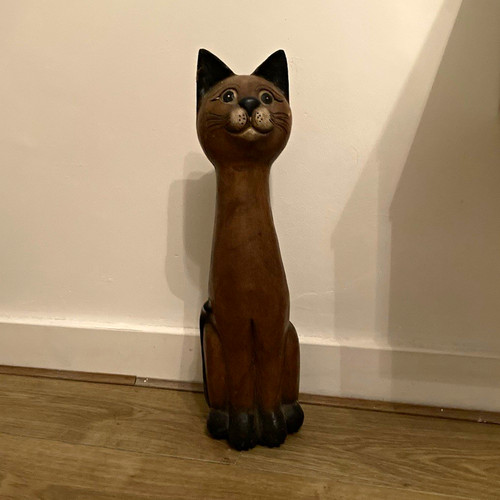 Hand carved wooden cat - hand,
