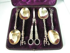 ANTIQUE BOXED SET OF FIGURAL SILVER PLATED SERVING SPOONS & GRAPE SCISSORS