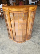 20thC bow front glazed China cabinet bookcase shelves