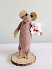 Hand made needle - hand, felt