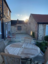 Teak garden table and 4 chairs.   Used but really good condition.