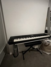 Roland RD800 Stage Piano 88-Key with Sustain Pedal And Small Amp