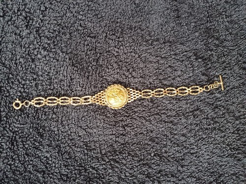 9ct gold 22ct half sovereign - half,