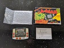 A MAN (Pacman) vintage LCD handeld Game / Clock boxed - amazing condition