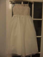 Jasmine champagne lace tulle bridesmaid dress with front bow and thin straps.9 y