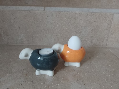 Two herdy egg - cups, .