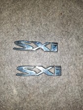 VAUXHALL CORSA D 2006-2014/ZAFIRA B & C INSIGNIA ASTRA "SXI"  OR  "S" BADGES X 2