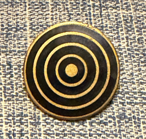 Round black enamel pin found - round,