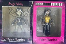 2 collectable dolls.  One scary fairy and one rock with attitude fairy.