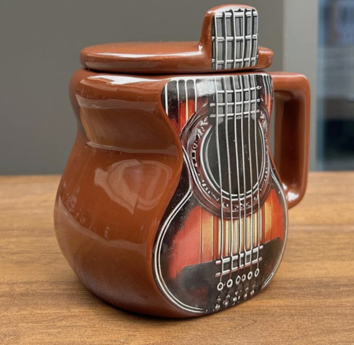 Guitar shaped ceramic - guitar,
