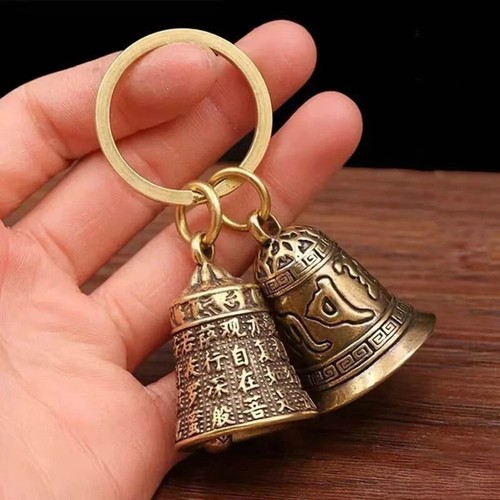 Six character carved bell - carved,