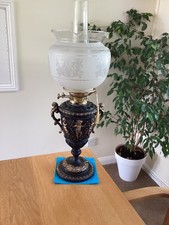 A Spelter Vase Oil Lamp.        Free U.K. postage.