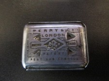 Antique Perry & Co metal nib box and nibs.