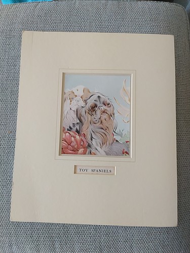 Mounted book plate dogs - mounted,