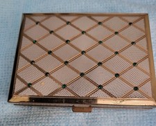 Vintage musical powder compact