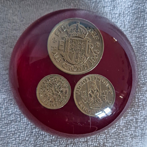 Red glass paperweight with - red,