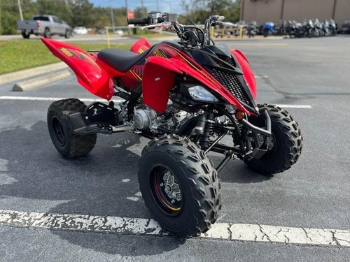 Red black yamaha raptor - &,