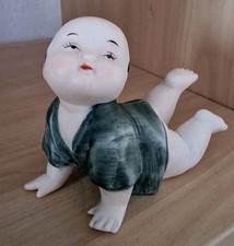 Vintage Chinese Asian Crawling Piano Baby Porcelain Hand Painted Figurine