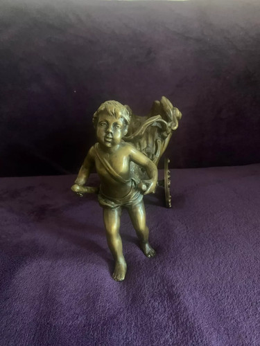 Bronze cherub boy pulling - cherub,