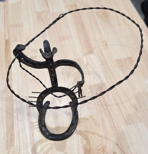 Iron horseshoe cowboy - horseshoe,