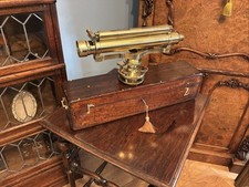 A QUALITY BRASS MAHOGANY CASED