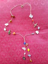 Handcrafted Boho necklace with multicoloured sea glass beads on natural cord