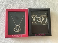 PLAYBOY JEWELLERY. PAIR OF EARRINGS AND NECKLACE. NEVER WORN. LICENSED PRODUCT.