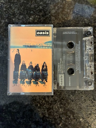 Oasis roll with - oasis,