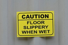 CAUTION FLOOR SLIPPERY WHEN