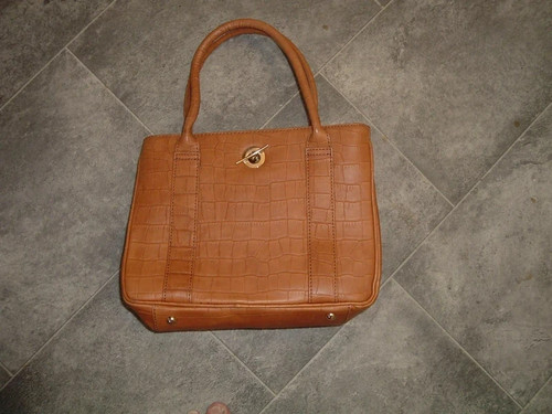 Osprey graeme ellisdon tan - by,
