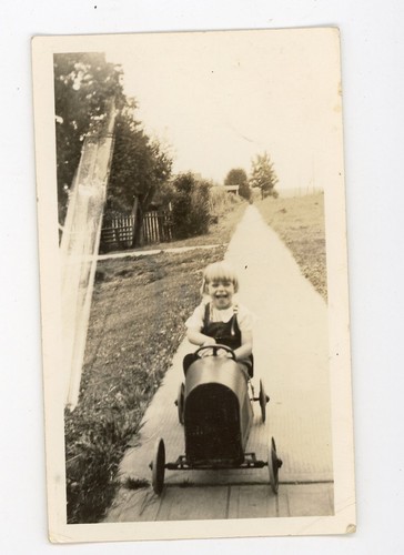 Little girl riding - toy,