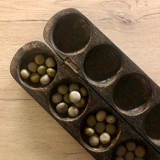 African mancala wooden game