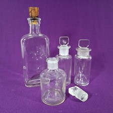 Four Vintage Glass Apothecary / Medicine Bottles.