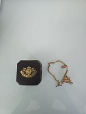 Juicy Couture Charm Bracelet Boxed with Carrage and Melon Charms. Never Worn