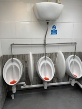 3 Urinals With Dividers