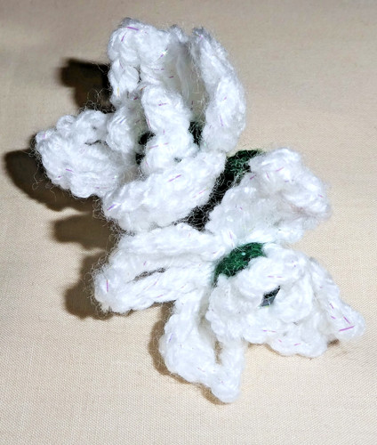 Hand crochet snowdrop flower - hand,