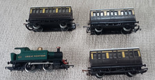hornby gwr loco(0-4-0) and three coaches taken from a set