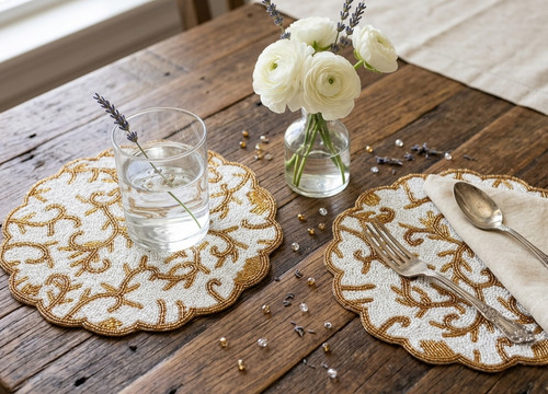 White and gold placemats - and,