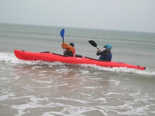 Photo 6x4 A tandem kayak surfing at Aberffraw  c2005