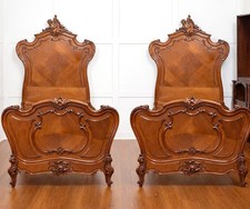Pair of Carved Walnut Single