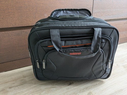 American tourister work - tourister, at