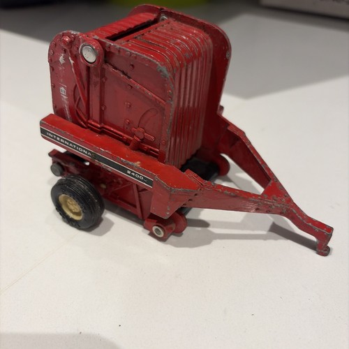 Ertl red hay baler - red,