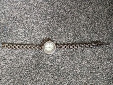 Ladies Avon White Metal Bracelet Circular Watch Battery Operated Needs Battery