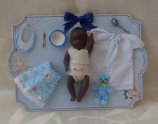 antique 4 inch black baby doll