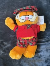 Garfield holding golfing - golfing, teddy