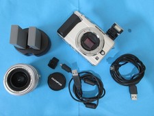Olympus Pen E-PL1 Mirrorless Digital Camera + M.ZUKIO 14-42MM Lens, 2x batteries