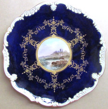 COALPORT PORCELAIN 9⅛" PLATE COBALT BLUE / VIEW OF BAMBURGH CASTLE (11185)