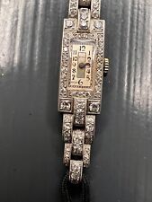 Tiny - A platinum diamond set Art Deco cocktail watch