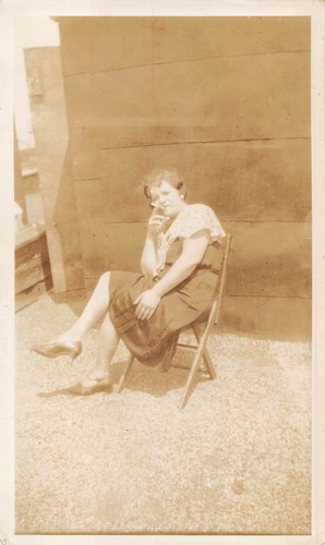 Antique woman smoking - smoking, rooftop