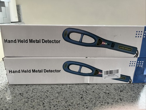 Hand held metal detector - hand,